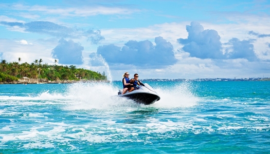 2 people on a jet ski in the ocean