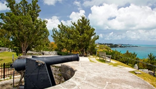 A cannon in an old fort overlooking the water