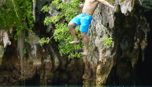 Man jumping into water