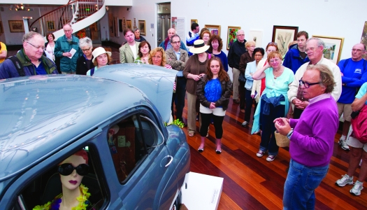Group of people around a car