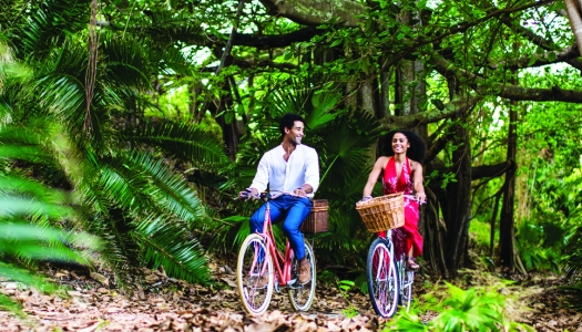 Couple biking on Railway Trail in Bermuda