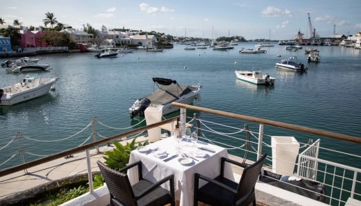 Patio table at Harbourfront Restaurant in Bermuda