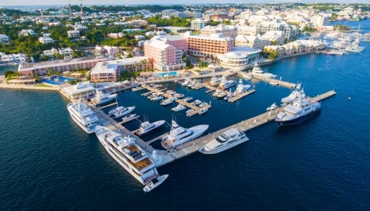 aerial image of the a marina filled with yachts and sail boats