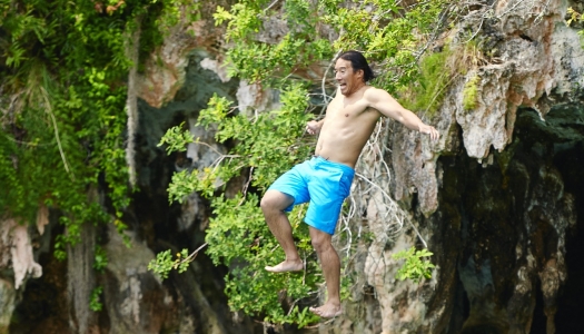 Jumping into water man