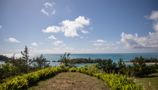 A wide angle from Fort Scaur with an ocean and beach view.