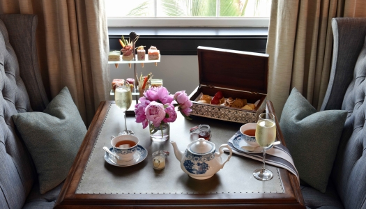 A table filled with afternoon tea items. 