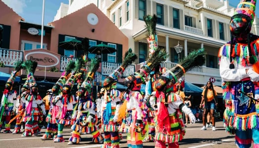 A group of Gomeby Dancers are on front street.