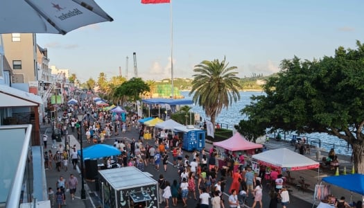 A birdseye view of Front Street filled with people and vendors.