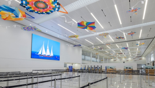 Interview of the LF Wade airport with colourful kites on the ceiling.