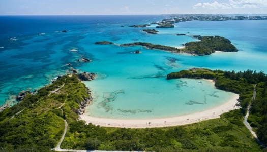 An aerial view of Cooper's Island with various beaches and Non Such Island