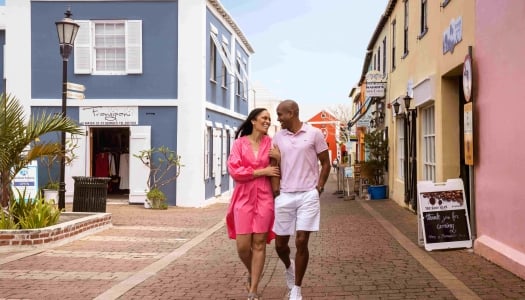 A Couple is walking down the street of St. George's