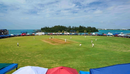 A view of an Eastern County Game with an ocean view in the background.