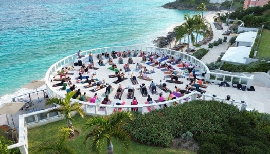 Aerial view of a group of people doing yoga at The Loren.