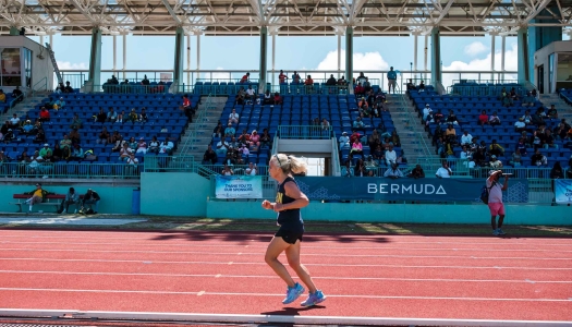 A woman is running at the USATF Master's Event