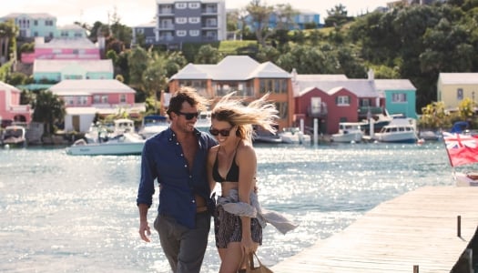 A couple are walking on a dock at Flatt's Inlet.