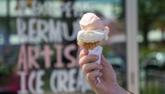 A close up of ice cream in front of a store.