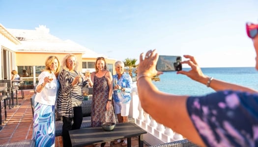 A group of women are posing for a photo