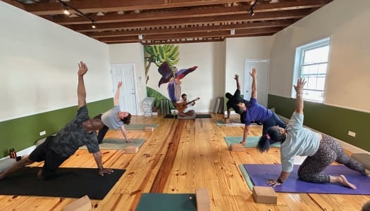 A group of people doing yoga at Treehouse