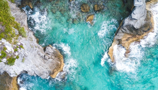 An aerial view of a cove along the coast of Bermuda