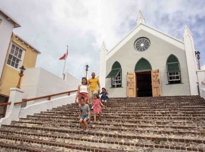 A family walking down church stairs in Bermuda