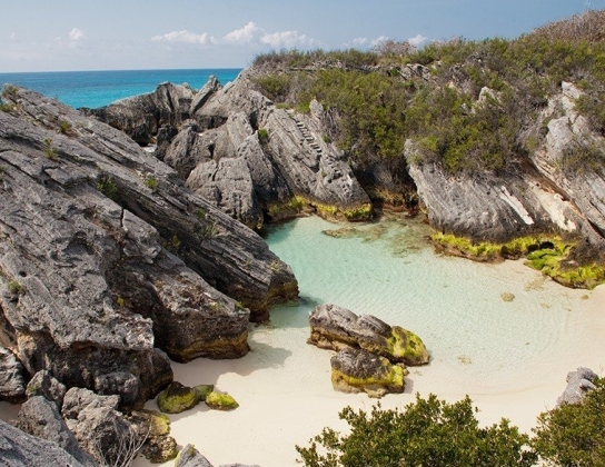aerial view of large rocks on beach