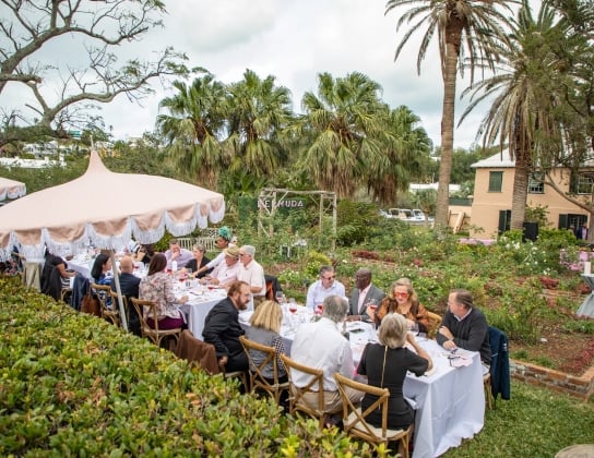 A group dining outdoors in Bermuda