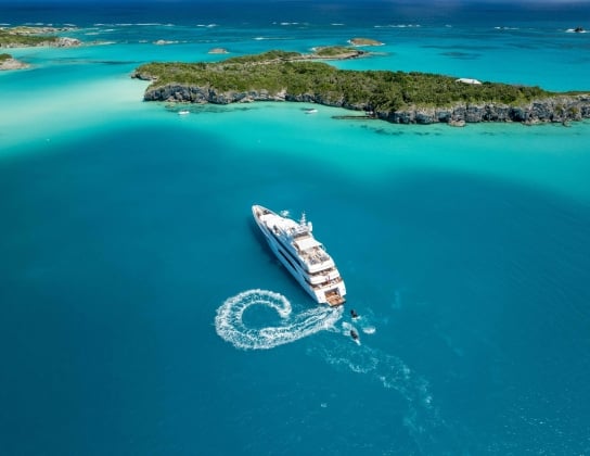 Jetskis by a Super Yacht