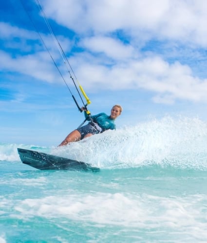 woman kite surfing at Horseshoe Bay