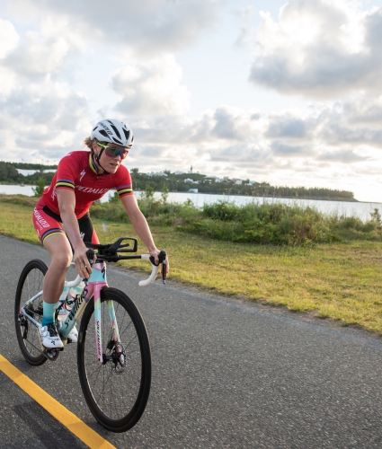 cyclist riding along the Bermudian shoreline 