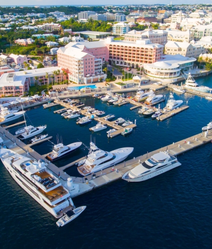 aerial image of the a marina filled with yachts and sail boats