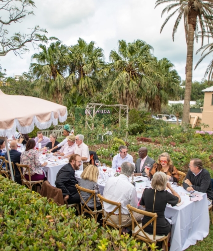 A group dining outdoors in Bermuda