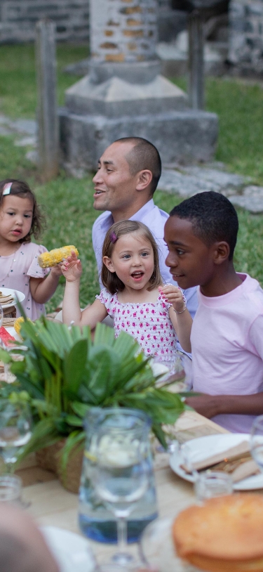 A family enjoying dinner in Bermuda 