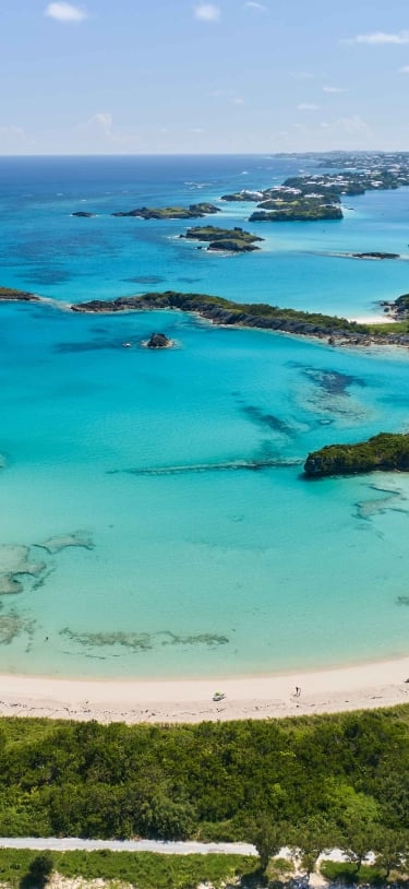 An aerial view of Cooper's Island with various beaches and Non Such Island