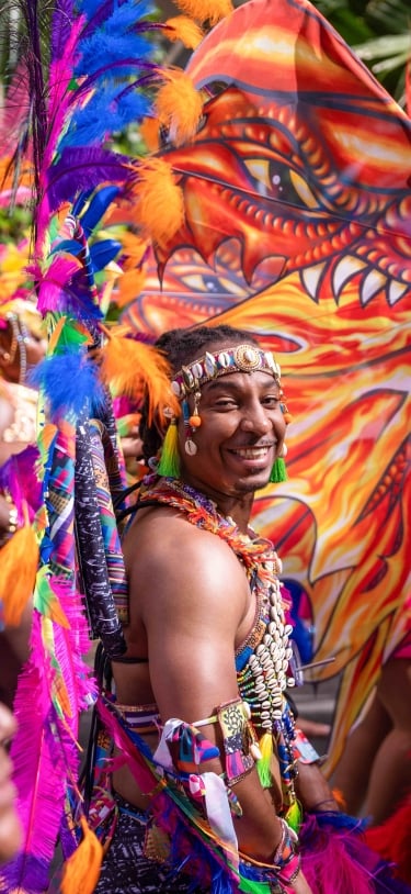 A man is posing at Carnival in Bermuda
