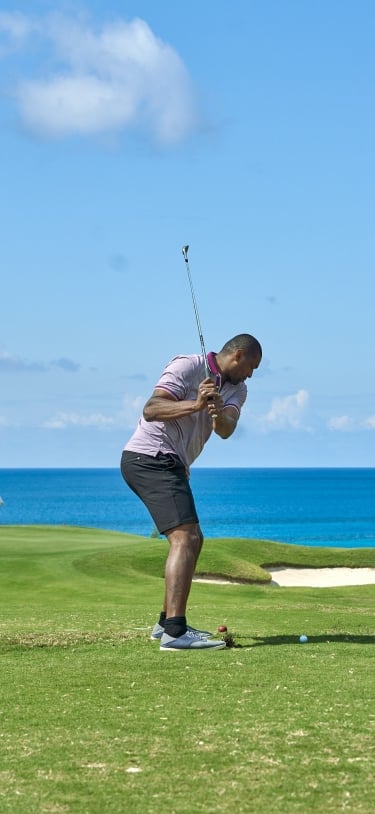 View of a golfer playing at Port Royal.