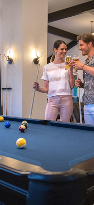 Boundary Sports Bar and Grille – Couple Playing Pool At Boundary