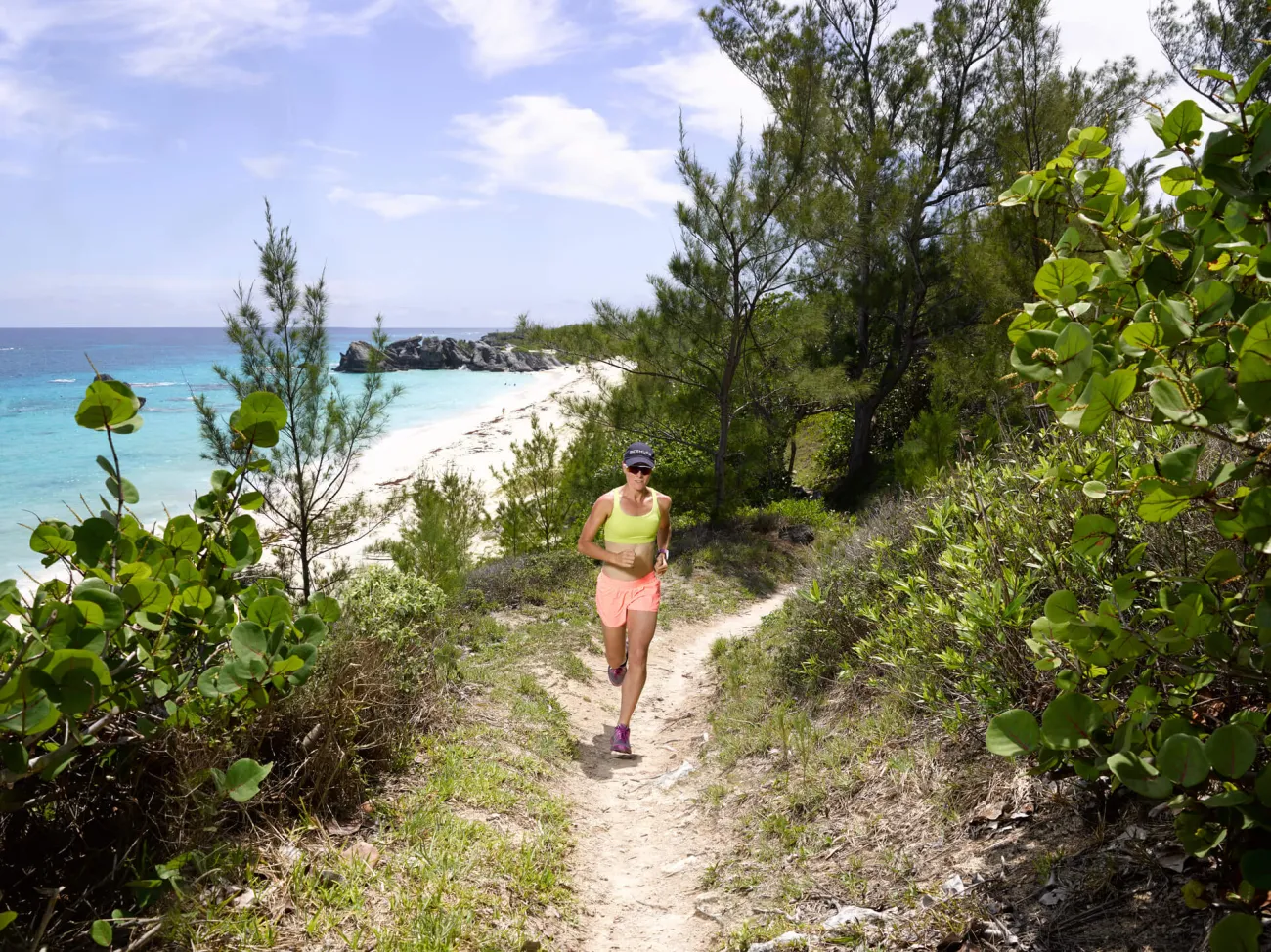 Flora Duffy running on a trail