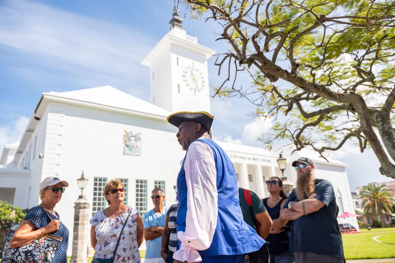 Town crier giving a tour of town.