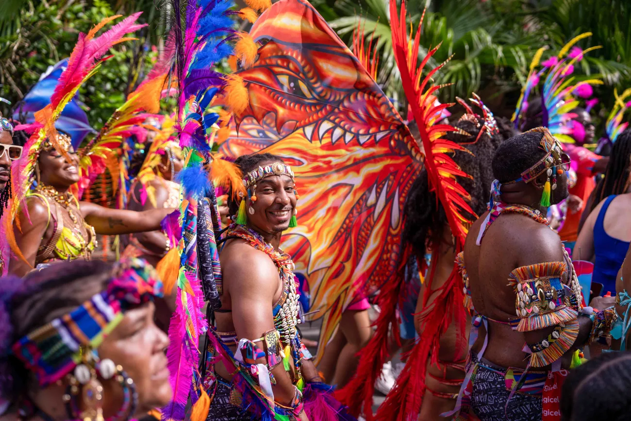 A man is posing at Carnival in Bermuda