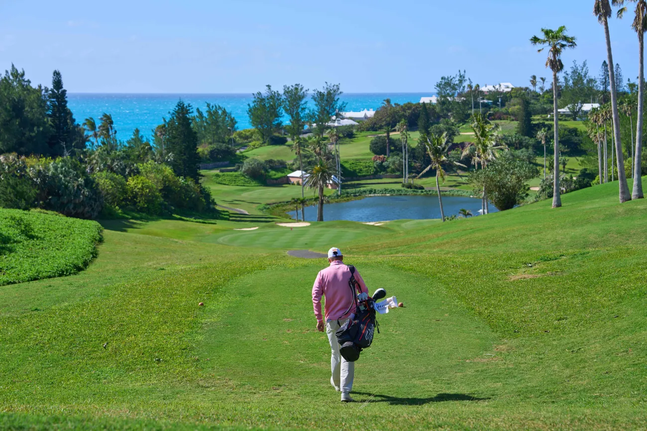A man is walking on the Turtle Hill Golf Course