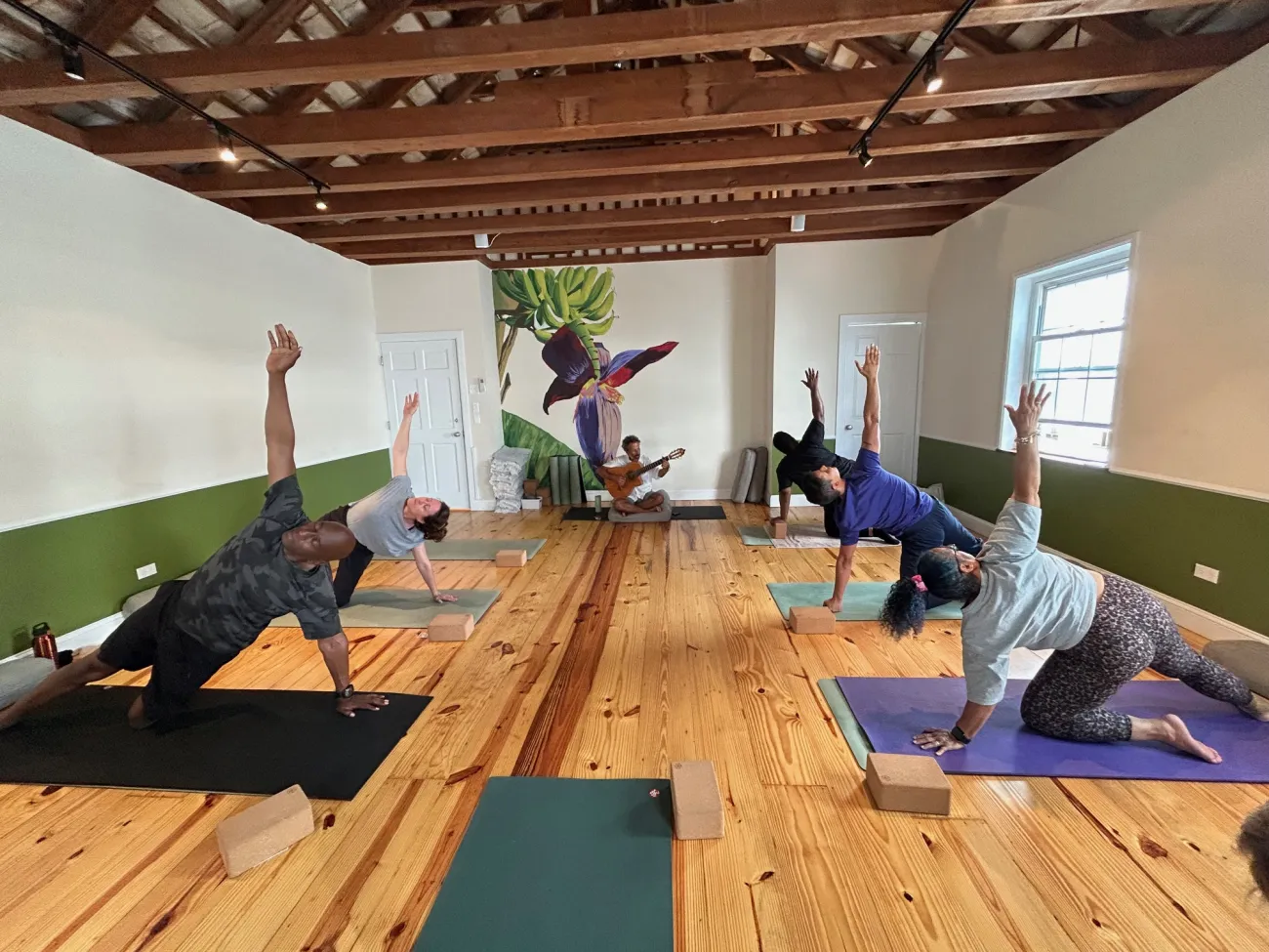 A group of people doing yoga at Treehouse