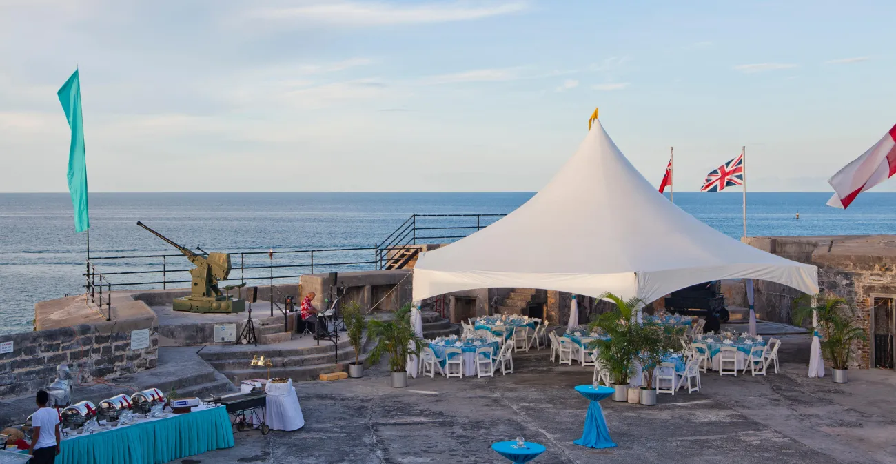 View of Fort St. Catherine set up for an event with ocean views in the background.