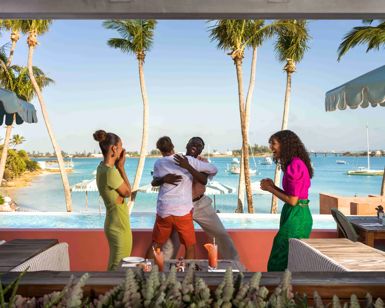 A group of friends are smiling and laughing together.