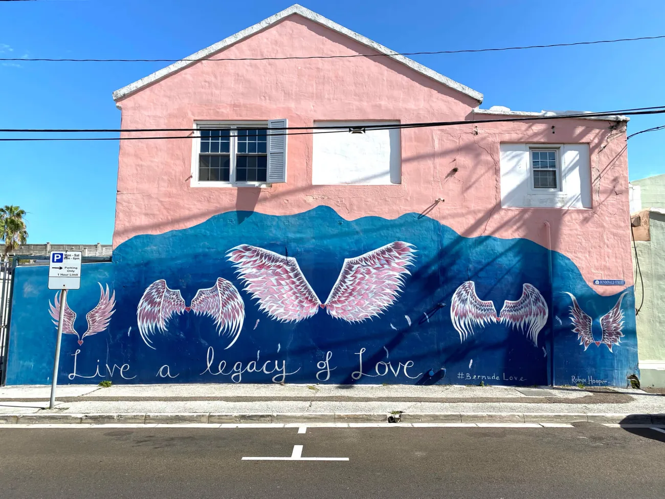 Blue wall mural with angel wings
