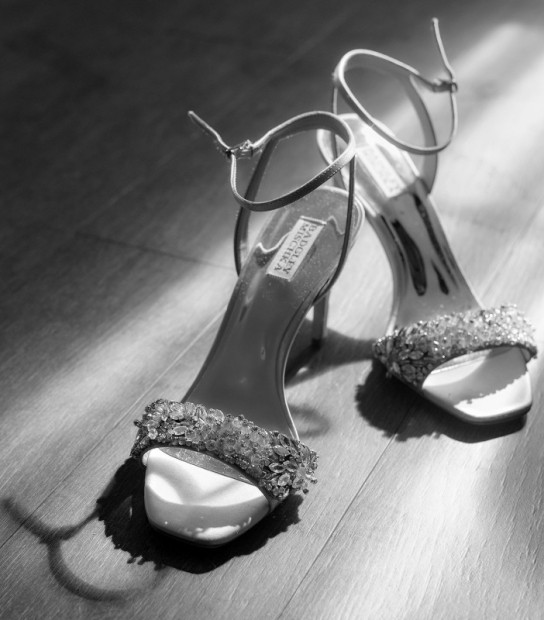 black and white image of high heel shoes