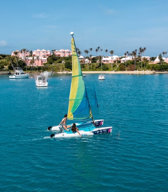 A couple is sailing by Cambridge Beaches