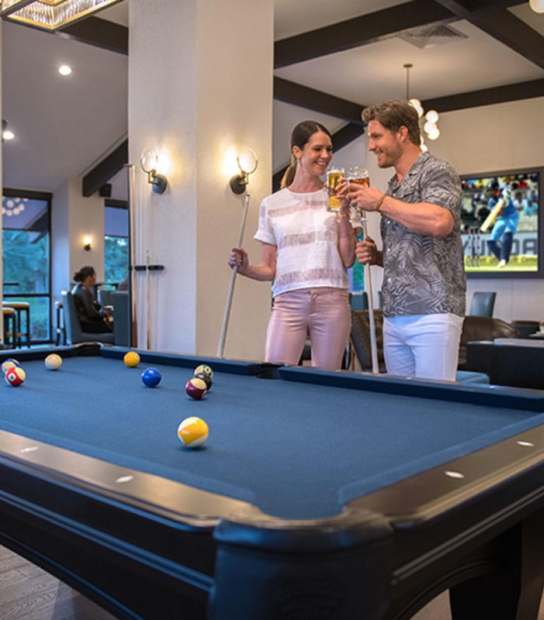 Boundary Sports Bar and Grille – Couple Playing Pool At Boundary