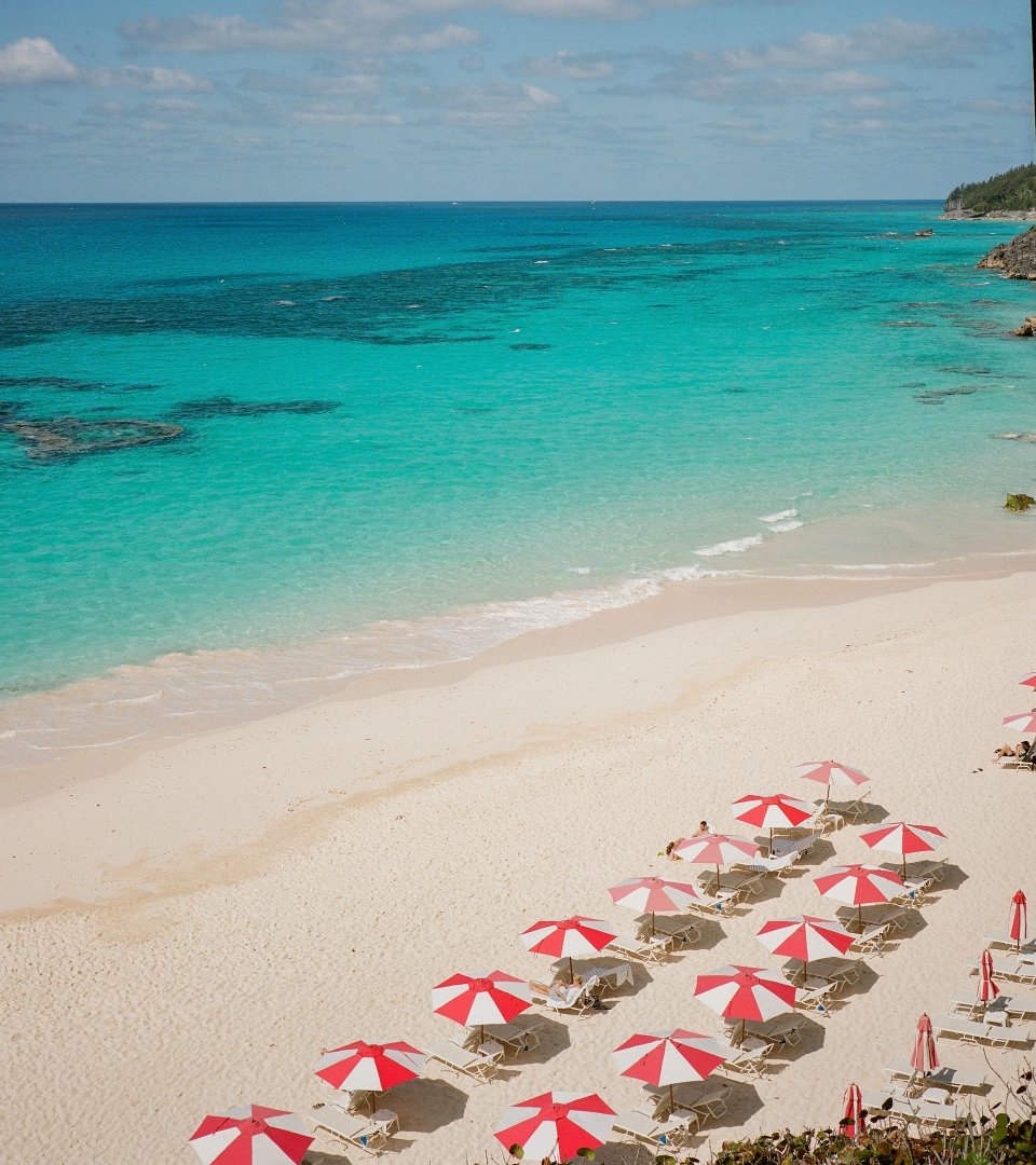 A line of umbrellas on the beach in Bermuda