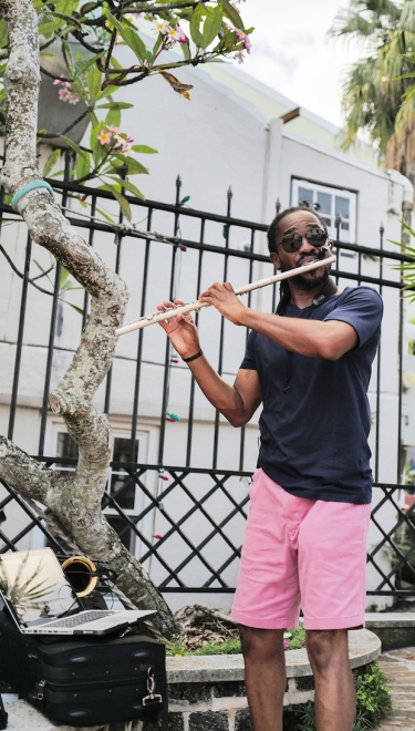 A man performing on his flute in Bermuda