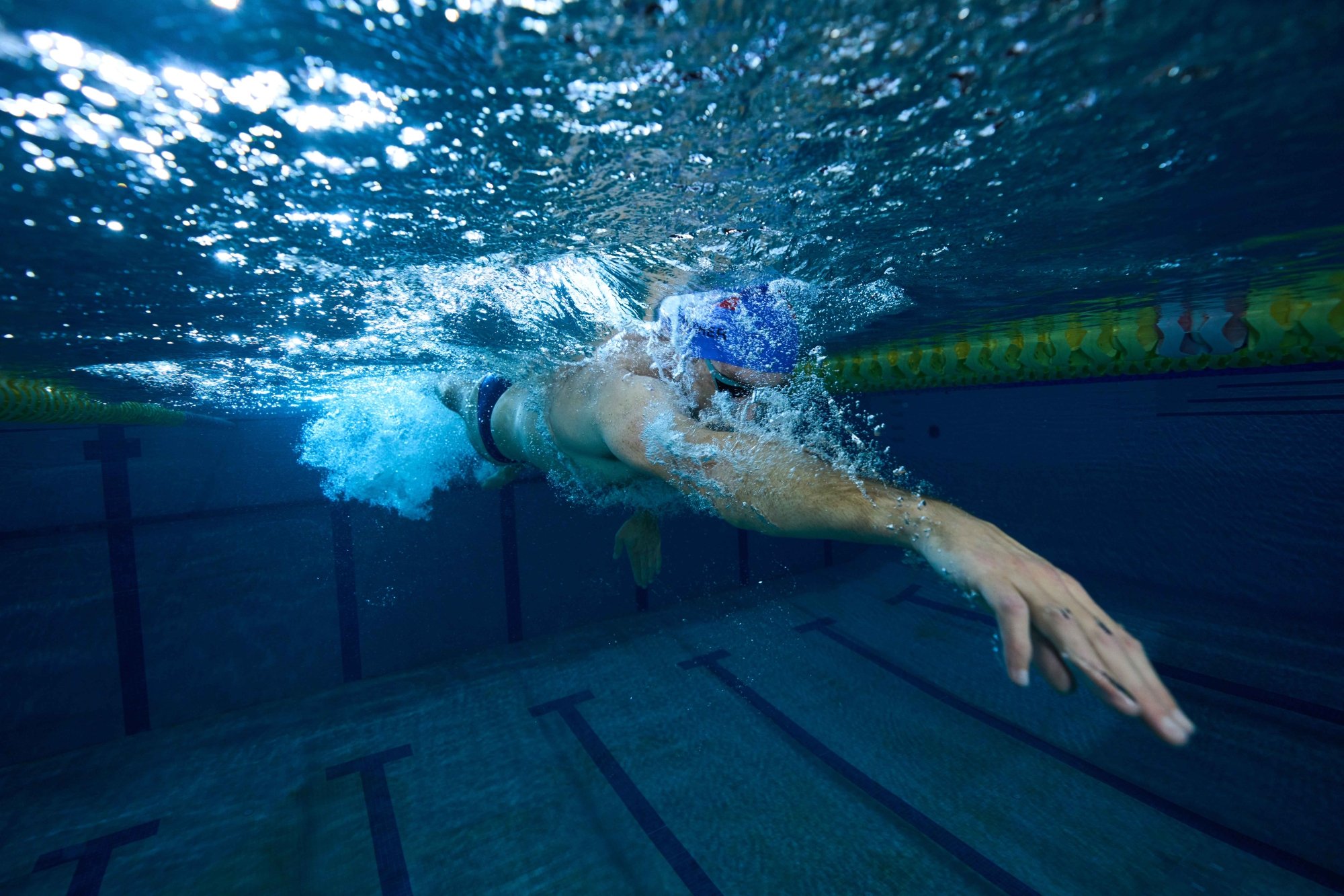 A man is diving into the water. 